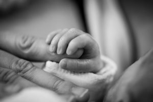Baby’s hand | emdr therapy in greenwood village, co | birth trauma therapist | postpartum depression counseling | Greenwood Village, CO 80126 | 80130 | Littleton, CO 80127 | 80124 A baby wraps her hand around her mom’s finger. Find out how postpartum depression counseling in Colorado can help you bond with your baby. Work with a birth trauma therapist in Englewood, CO, to overcome postpartum depression.