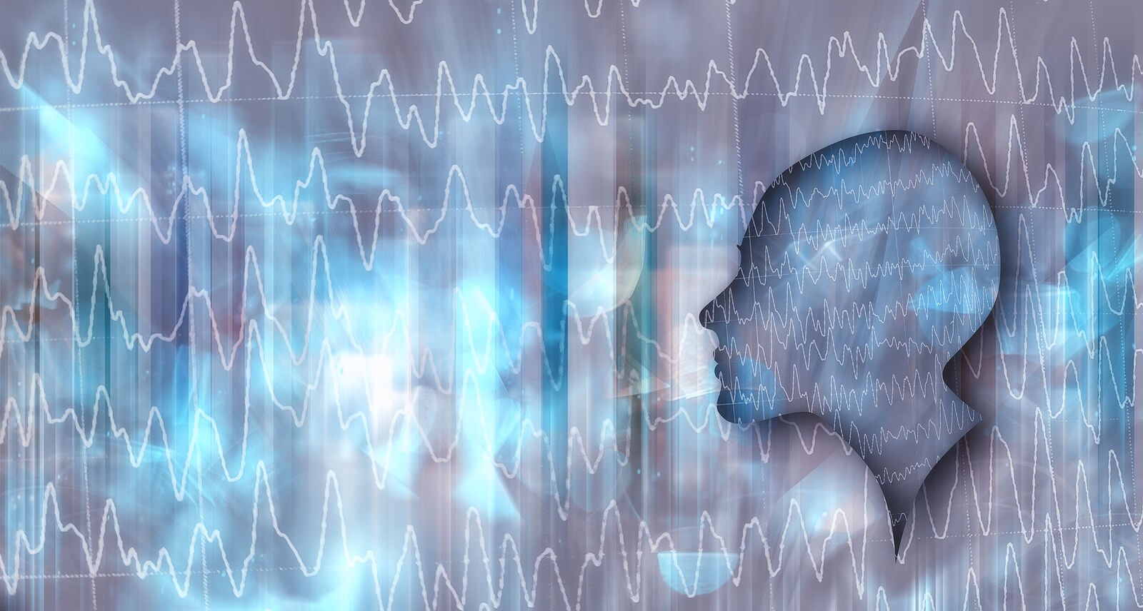 A conceptual graphic showing a human head silhouette in profile overlaid with brainwave patterns and glowing blue neural activity, representing the EEG monitoring process at the core of neurofeedback therapy in Littleton, CO and the surrounding area. This type of brainwave feedback is what guides each neurofeedback session — rewarding the brain in real time when it produces healthy, regulated activity. For those exploring neurofeedback Denver or nearby providers, this image reflects the science behind what makes neurofeedback such a precise and individualized approach to brain training. 